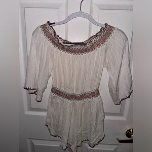 Cream romper with sleeves